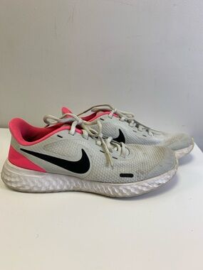 Nike Girls White Running Shoes with Pink Accents and Black Swoosh